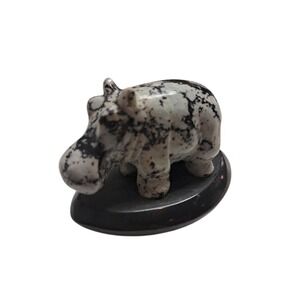 Small, hand-carved stone hippopotamus figurine